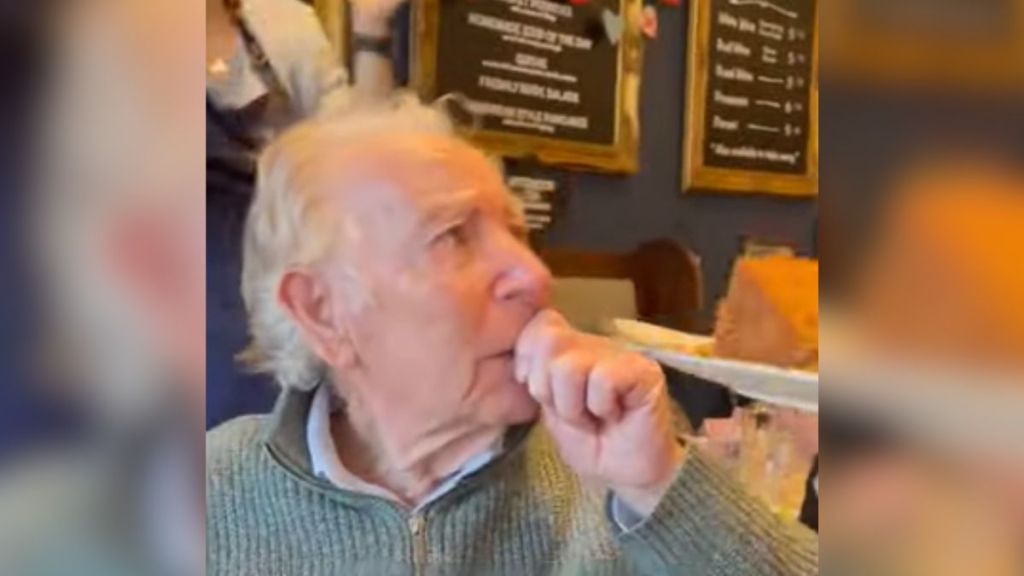 A grandpa is overcome with emotion on his birthday.