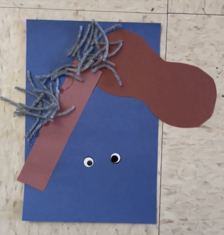 An abstract horse made by a preschooler from construction paper.