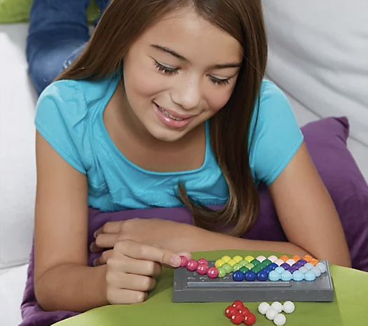 kid playing with puzzle