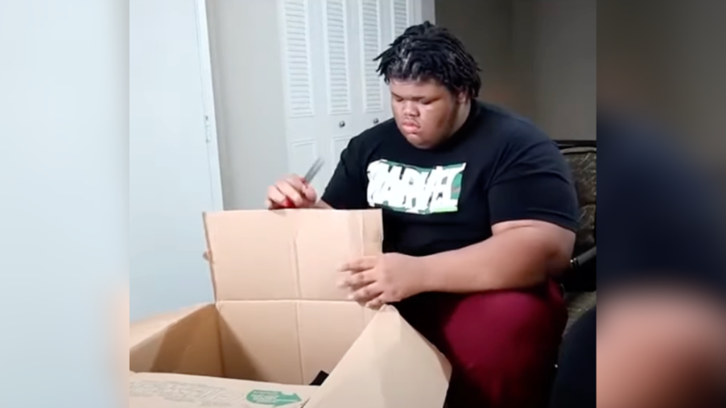 man opening a box