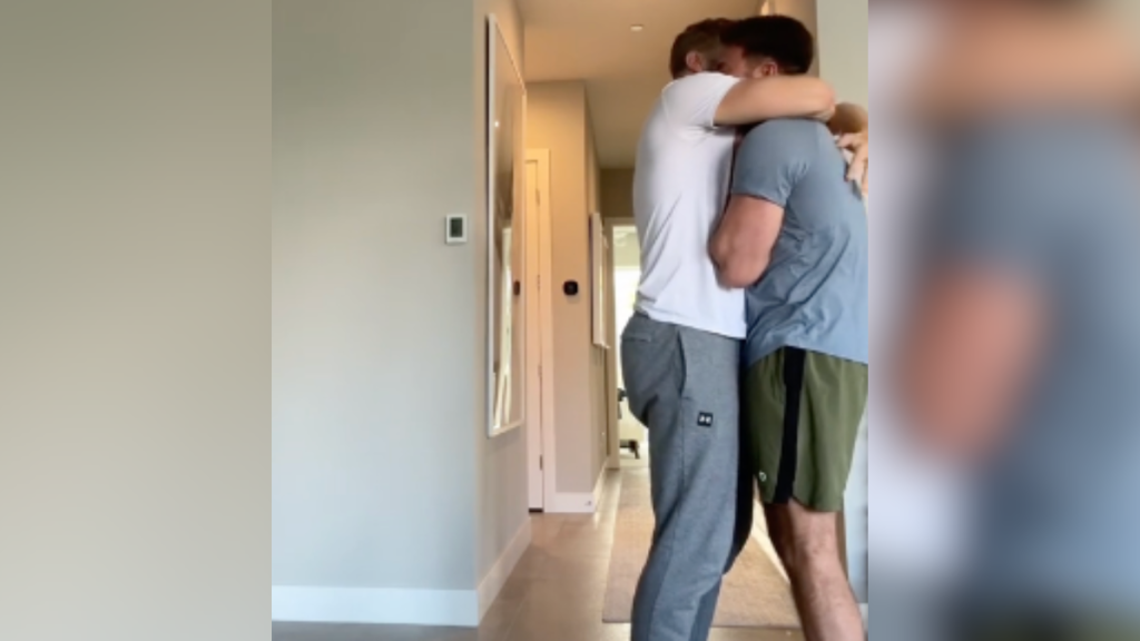men hugging