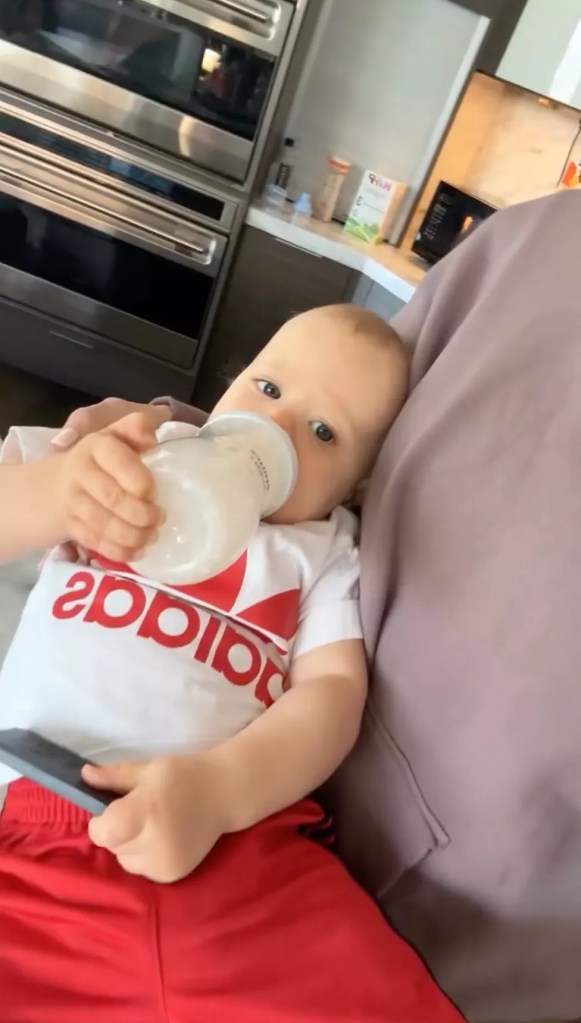Patrick Mahomes' baby, Bronze, drinking from a bottle. 