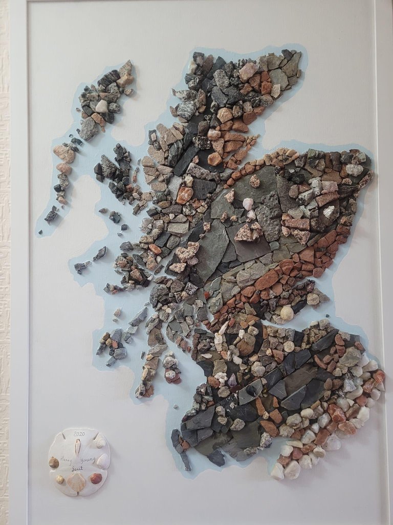A map of Scotland made with real rocks. 