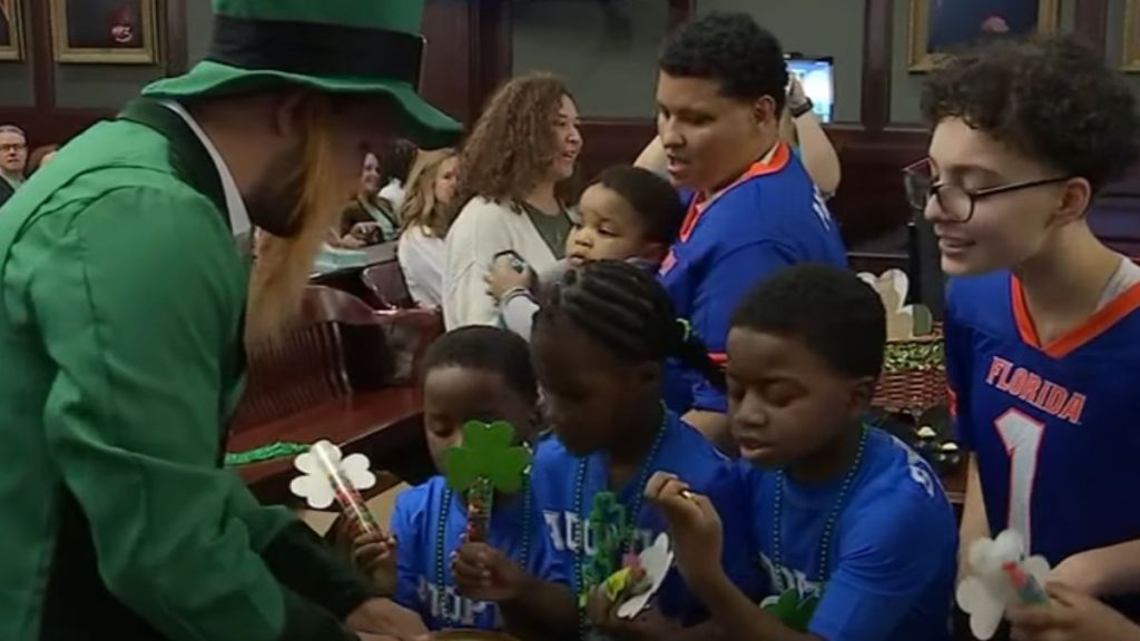 Children participate in a St. Patrick's Day adoption event.