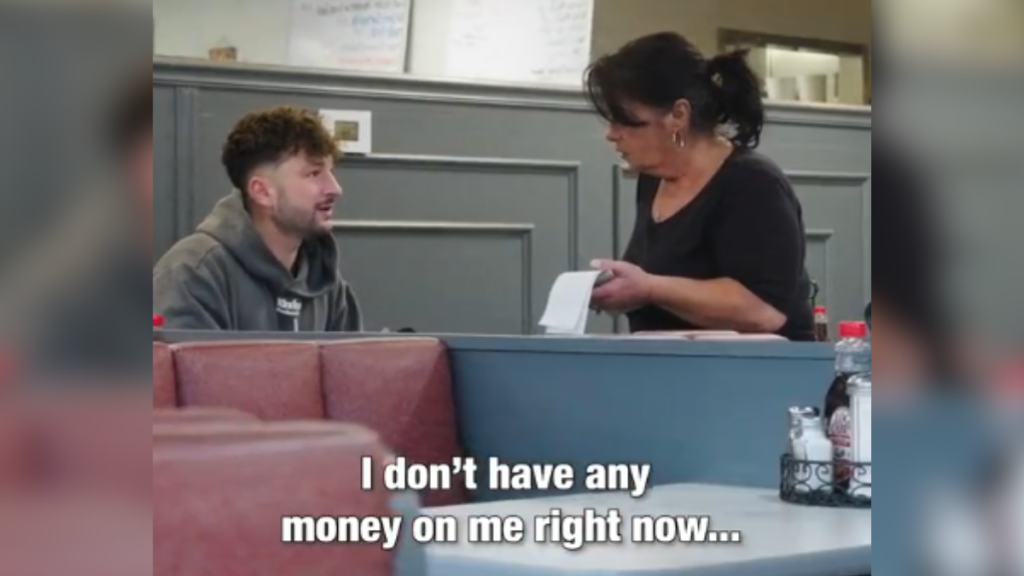 a man tells a waitress taking his order that he doesn't have any money