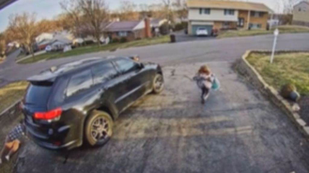 A little girl runs for help while her mom lays on the ground with a broken ankle.