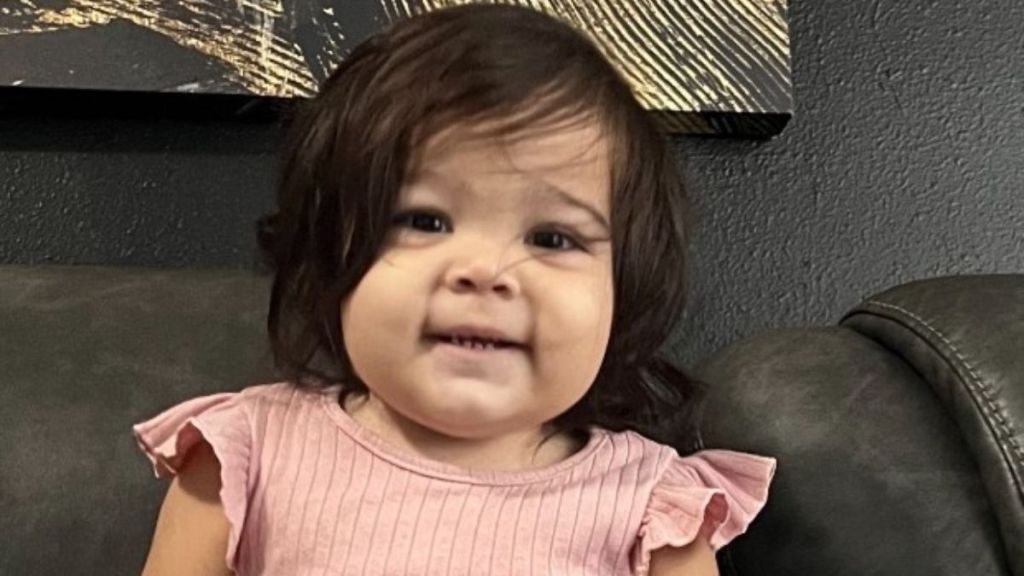 Image shows a little girl that was saved by a visiting doctor in her pediatrician's office.