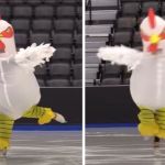 Images show a person figure skating in an inflatable chicken suit.