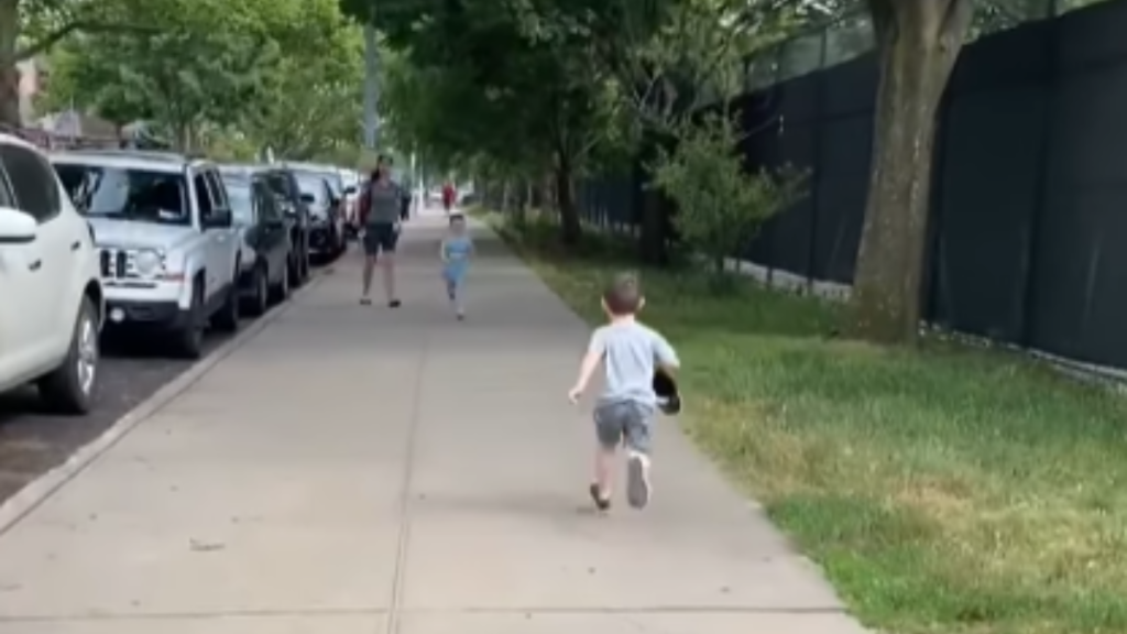 little boy running toward his best friend