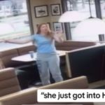 A girl points excitedly to her friend in a Dairy Queen.