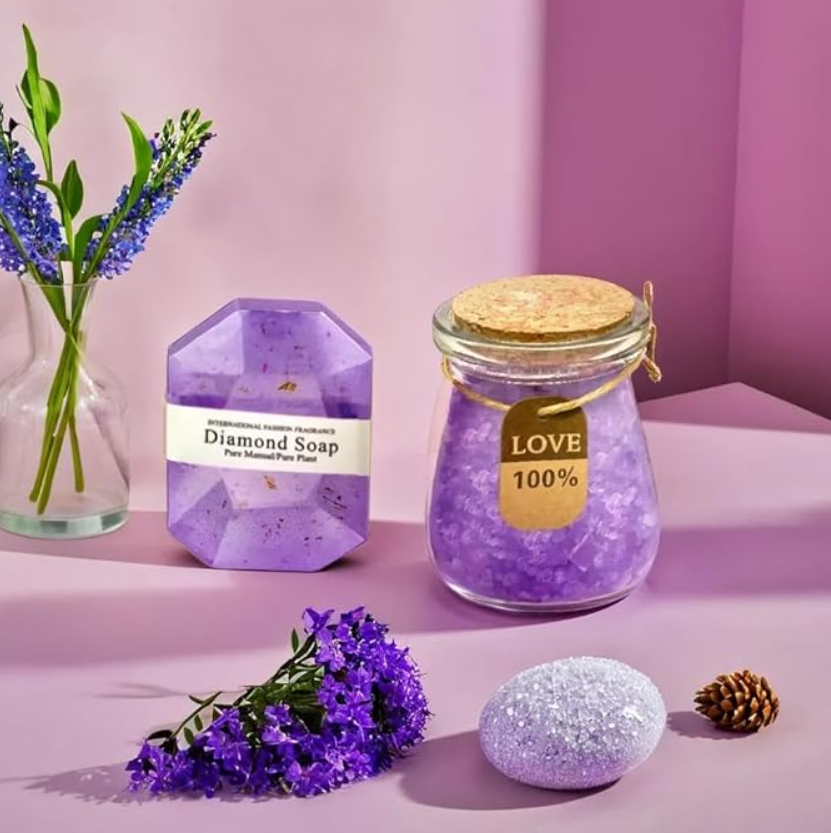 A variety of purple spa items like soap and salts.