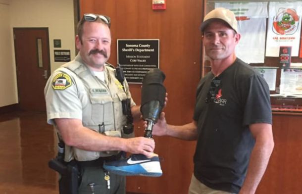 Sonoma Sheriff returning the found prosthetic leg to its owner.