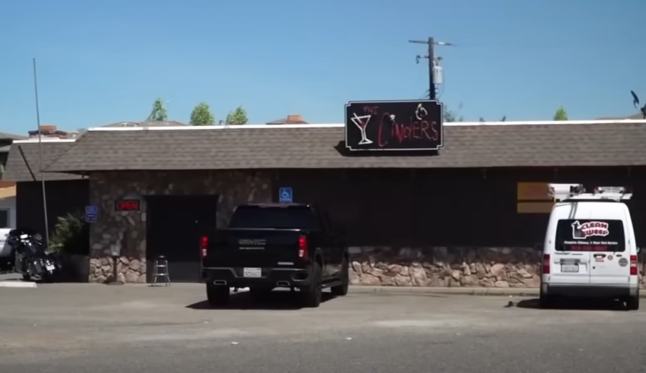 Exterior view of a bar called The Cinders.
