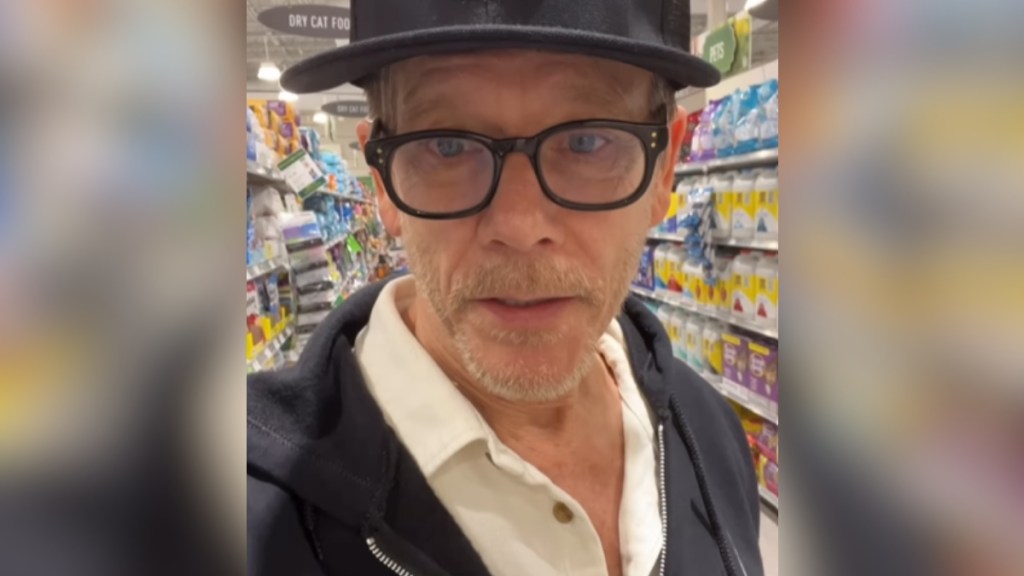 Kevin Bacon records himself talking to the camera as he grocery shops.