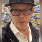 Kevin Bacon records himself talking to the camera as he grocery shops.
