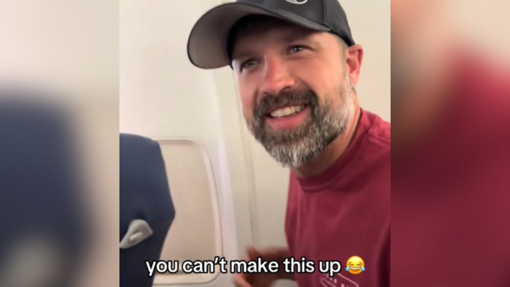 Hunter Hayes sits on a plane, looking both surprised and happy. Text on the image reads: you can't make this up