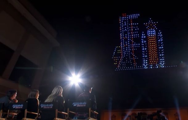 Image shows the Sky Elements drone show beginning with a rocket on the launch pad.