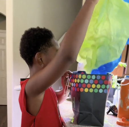 little brother opening gift