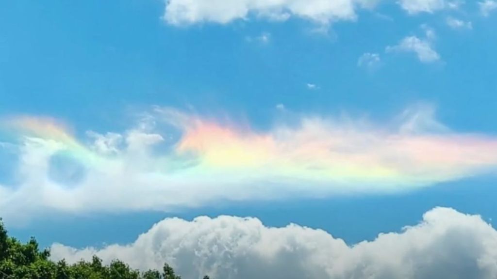 Image shows rainbow clouds that formed over Westland, MI in 2022.