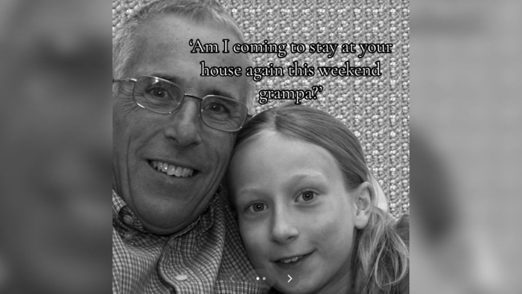 A grandpa and his young granddaughter in black and white.