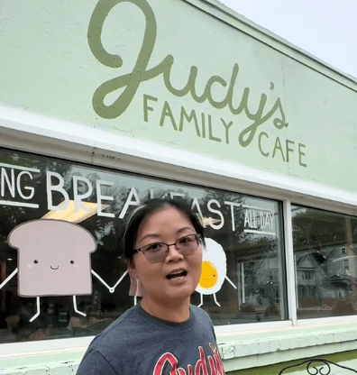 judy in front of diner
