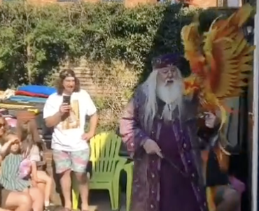 dumbledore at a party with kids