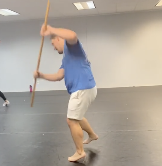 man dancing in a broadway dance class