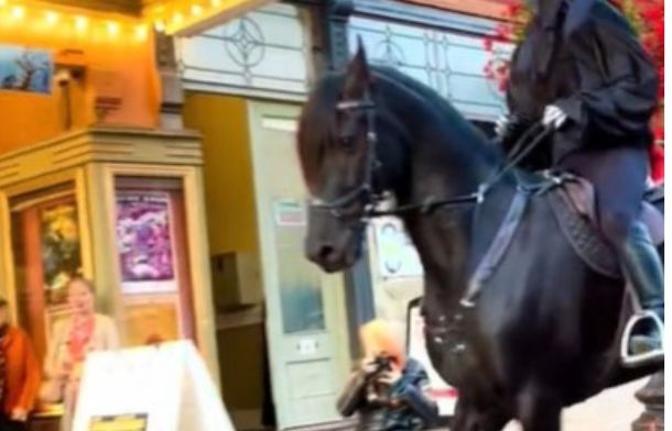 Image shows the headless horseman riding through Sleepy Hollow.