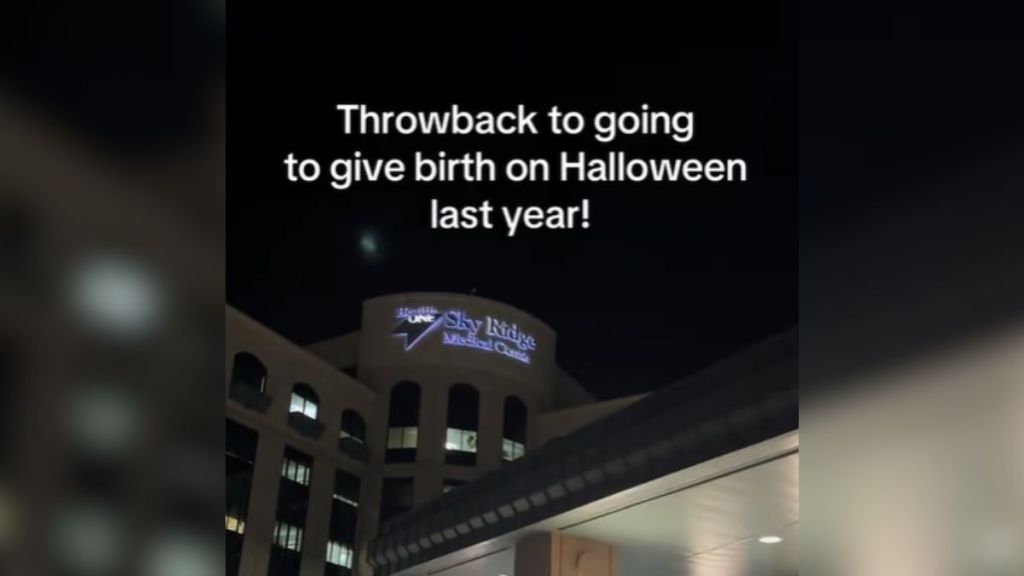 The exterior of a hospital at night.