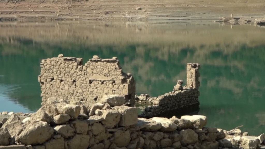View of crumbled buildings normally unseen under a lake in Greece