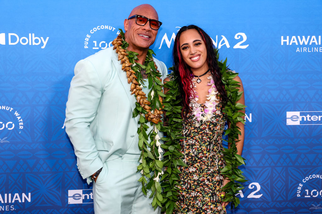 KAPOLEI, HAWAII - NOVEMBER 21: (L-R) Dwayne Johnson and Simone Garcia Johnson attend the world premiere of 'Moana 2' at Lanikuhonua Cultural Institute on November 21, 2024 in Kapolei, Hawaii. (Photo by Darryl Oumi/Getty Images)