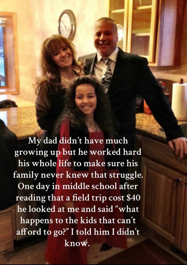 An old photo of Lauren Campbell and her parents from when she was a kid. Mom, Dad, and Lauren smile as they pose together in a kitchen.

Text on the image reads: My dad didn't have much growing up but he worked hard his whole life to make sure his family never knew that struggle. One day in middle school after reading that a field trip cost $40 he looked at me and said "what happens to the kids that can't afford to go? I told him I didn't know.