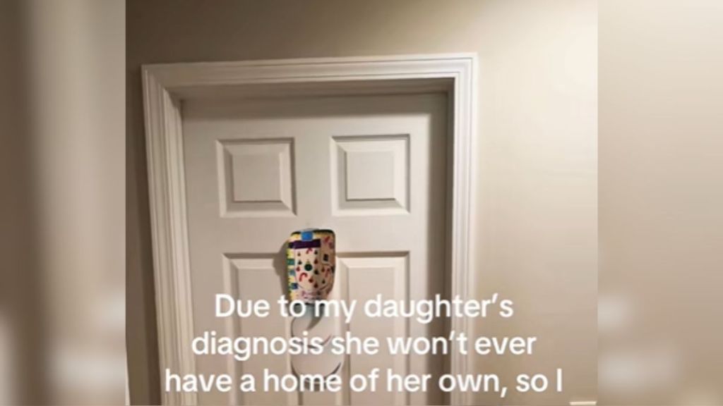 A white door with text over it.