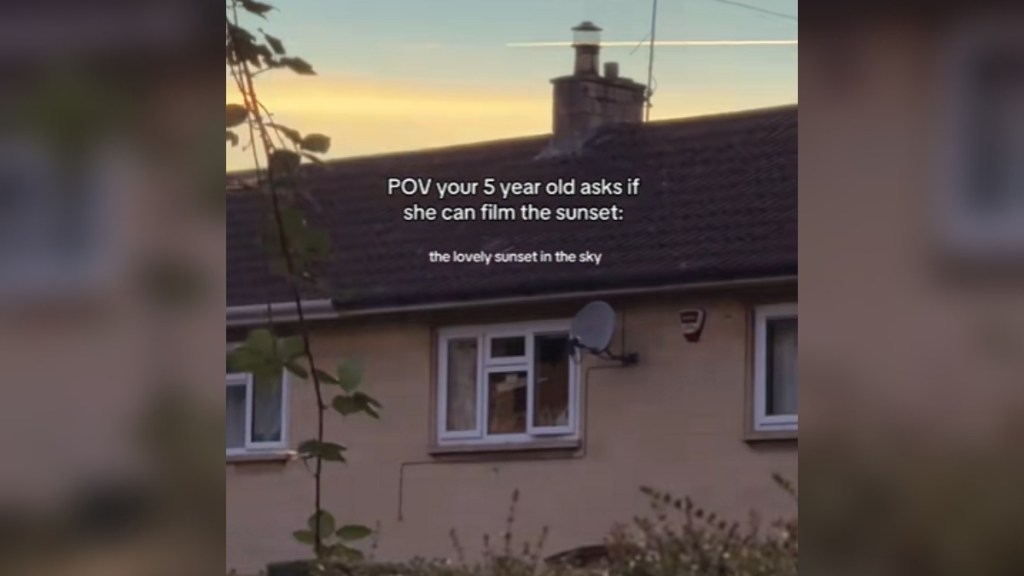 View of a house with a peek of the beautiful sunset just above the roof. Text on the image reads: POV: Your 5 year old asks if she can film the sunset Caption: the lovely sunset in the sky