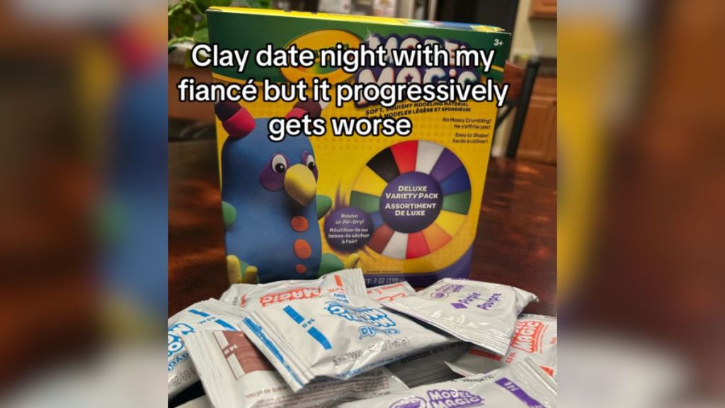 A colorful box and a pile of white packets.