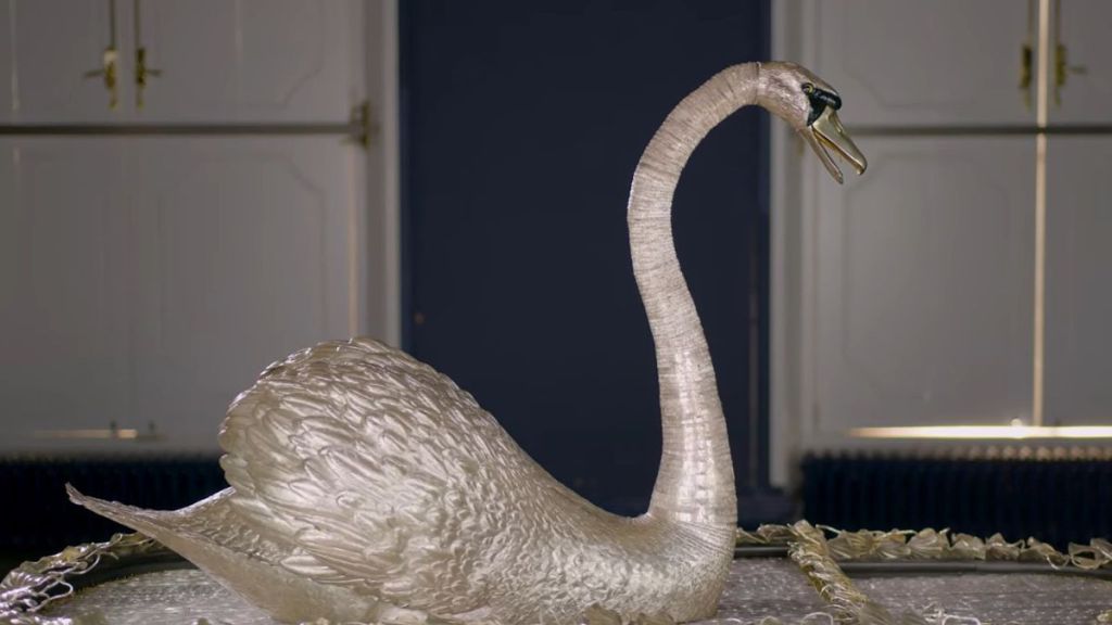 Image shows the Silver Swan automaton, a 250+ year old clockwork automaton with realistic movements.
