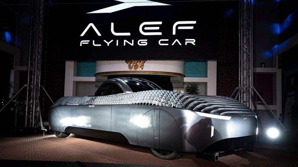 Model car from Alef Aeronautics of a flying car. The vehicle is silver and looks futuristic