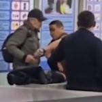Retired boxer's lightening quick speed disarms a knife-wielding man at an airport.