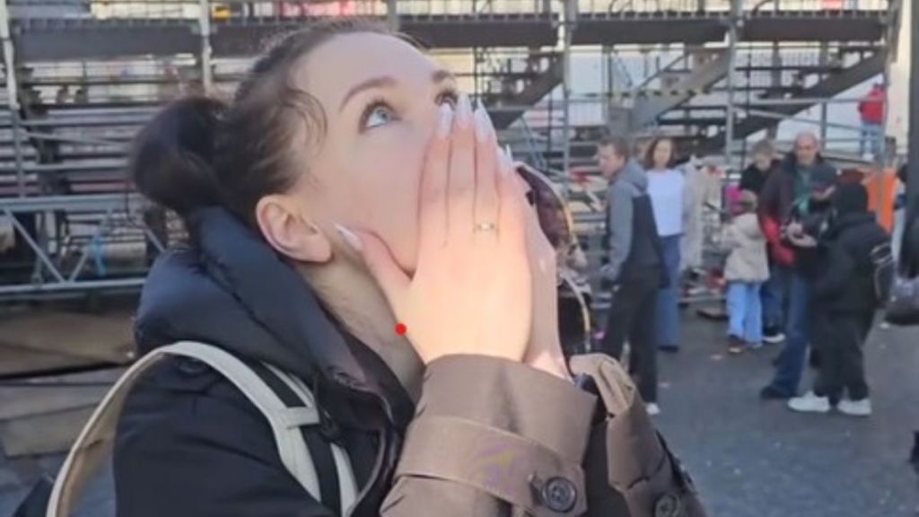 Woman seeing the Cologne Cathedral for the first time.