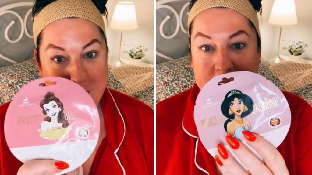 a woman holds up two different Disney face masks featuring Belle and Jasmine