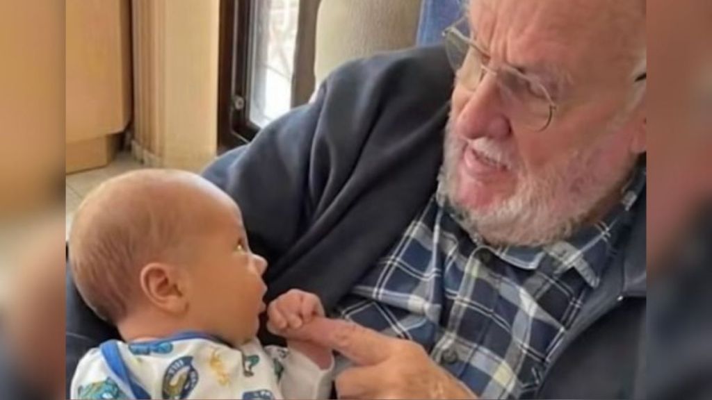 Plasma donating hero, James Harrison, with his grandchild.