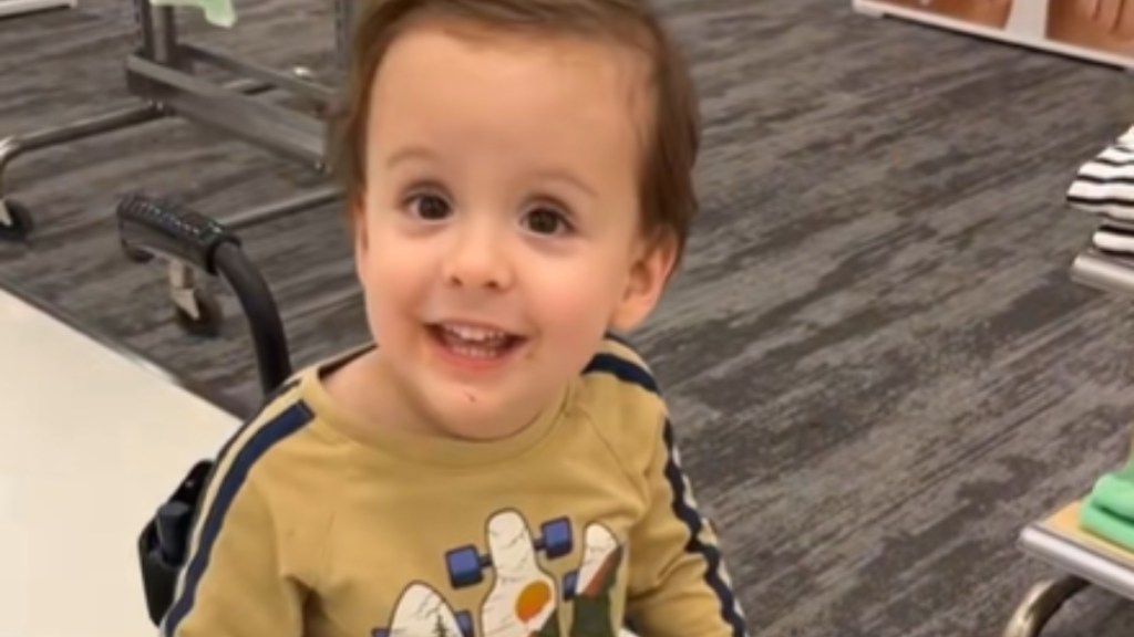 Close up of a little boy who is smiling wide