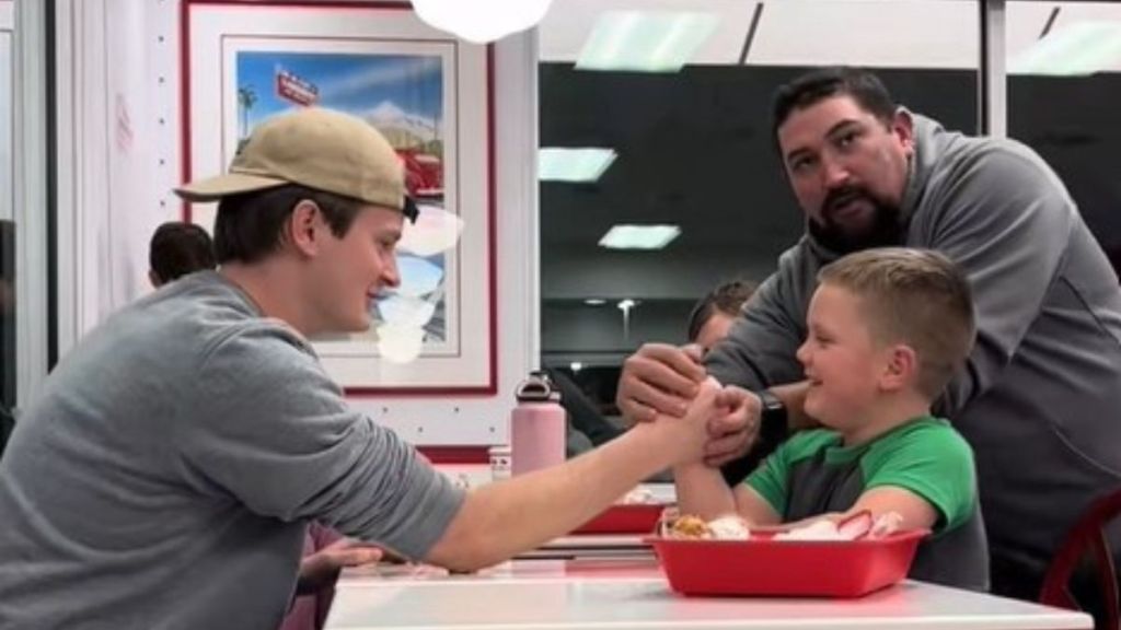 Beginning of arm wrestling match that reminded Isabel why she was in love with her boyfriend.