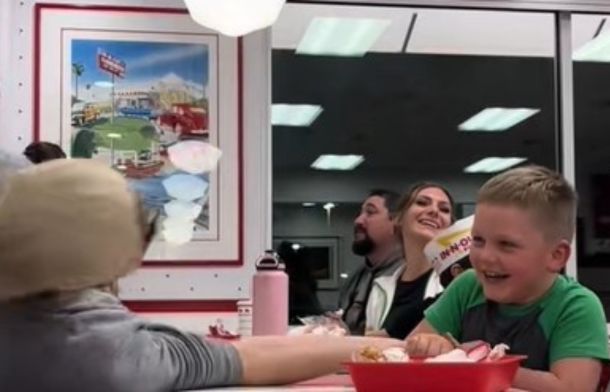 Image shows Isabel Judd's boyfriend losing an arm wrestling match to a child, making her realize her love for him.