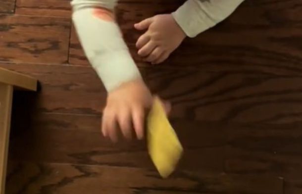 Image shows an angry toddler tossing a tortilla chip that her mom gave her as a peace offering.