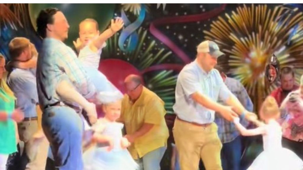 Image shows a daddy-daughter dance.