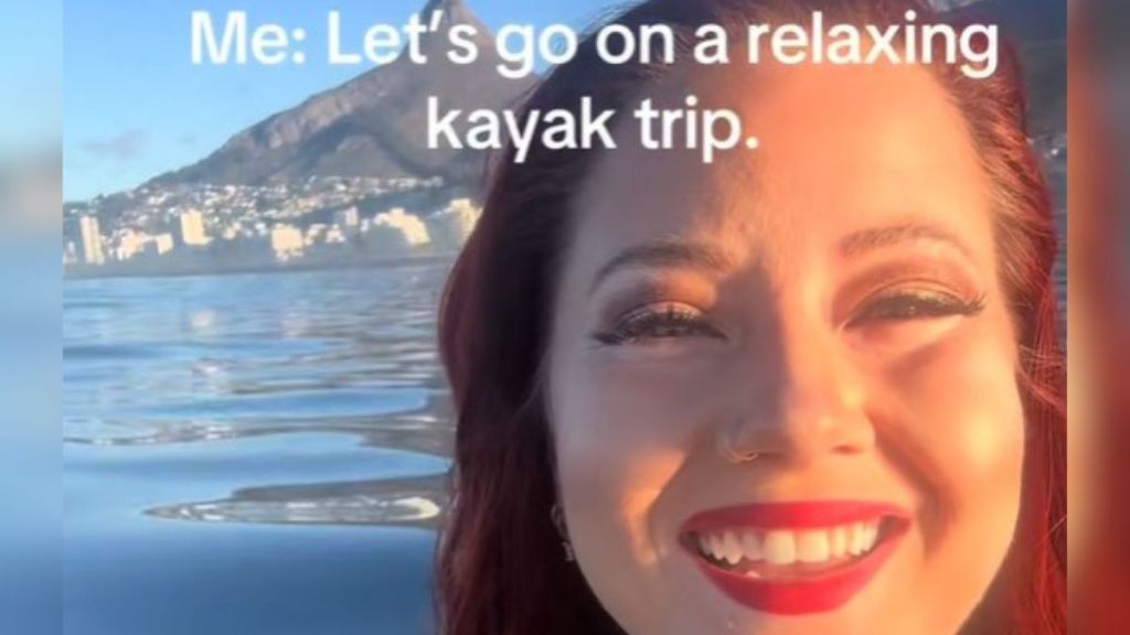 Image shows an optimistic kayaker before they realized they were boating over a jellyfish bloom.