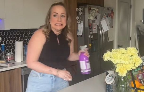 After getting caught during a kitchen concert by a neighbor, The singer tried to make it look "normal."