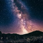 Night photo of a mountain against the beautiful sky. The Milky Way is visible