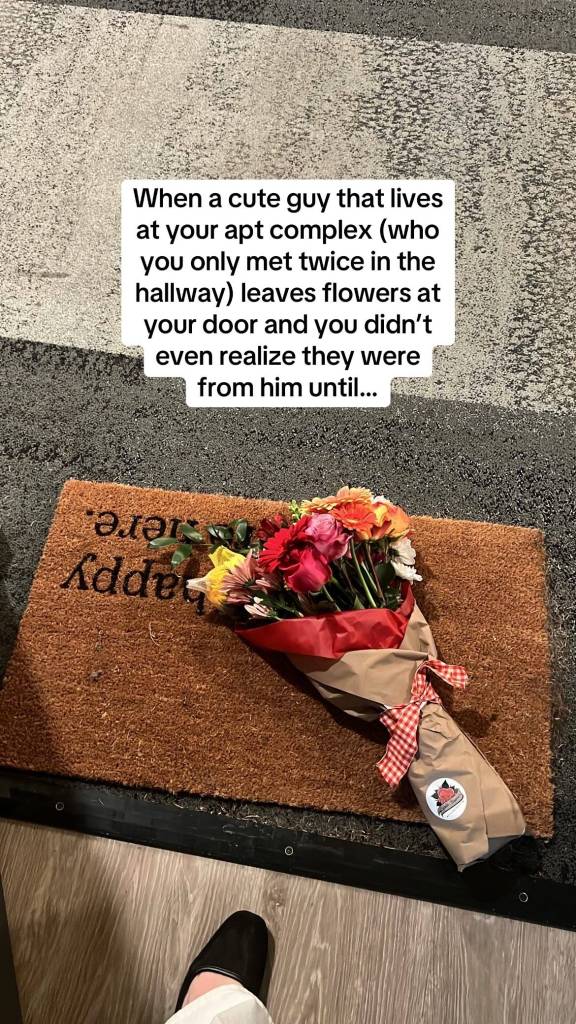 A bouquet of flowers rests on a front door doormat. Text on the image reads: When a cute guy that lives at your apt complex (who you only met twice in the hallway) leaves flowers at your door and you didn't even realize they were from him until...